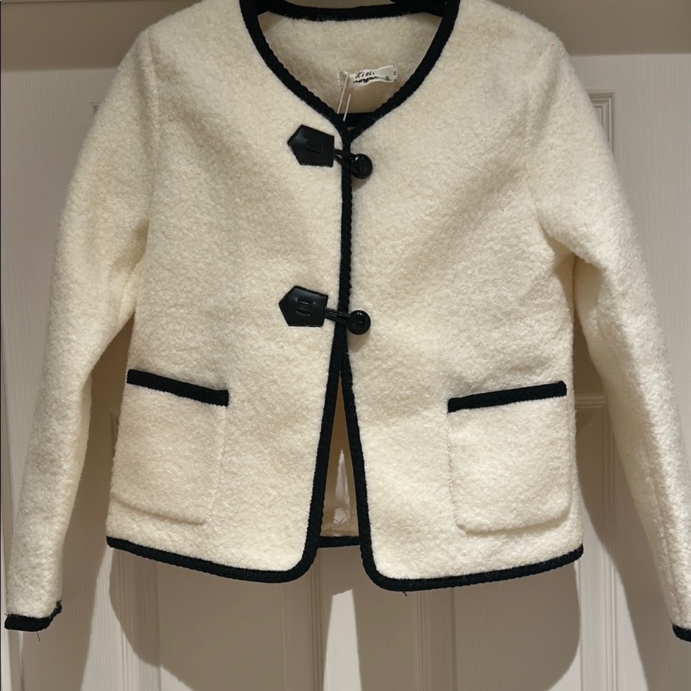 Chic Cream jacket with Black Trim